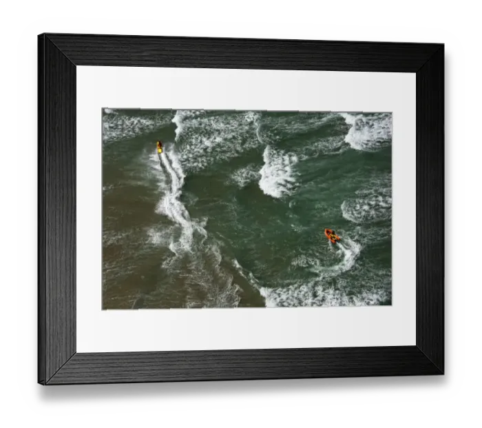 Framed Print : Lifeguards on a rescue watercraft (RWC) and arancia inshore rescue boat shot from Culdrose helicopter in St Ives