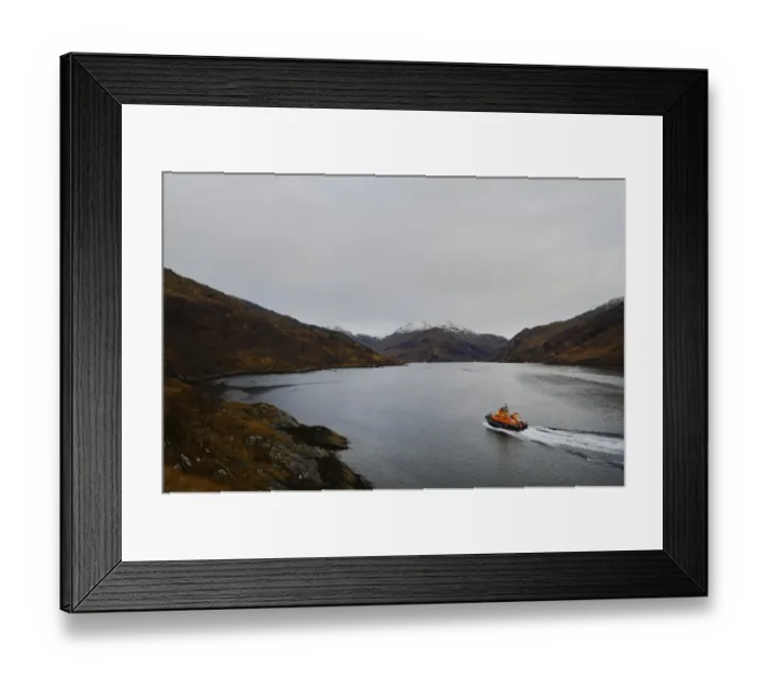 Framed Print : Mallaig severn class lifeboat Henry Alston Hewat 17-26 at sea, snow capped mountains in the background
