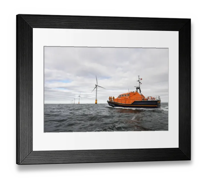 Framed Print : Barrow Tamar class lifeboat Grace Dixon 16-08 at sea, wind farm in teh distance. Shot for Dong Energy partnership press release Framed Print : Barrow Tamar class lifeboat Grace Dixon 16-08 at sea, wind farm in teh distance. Shot for Dong Energy partnership press release