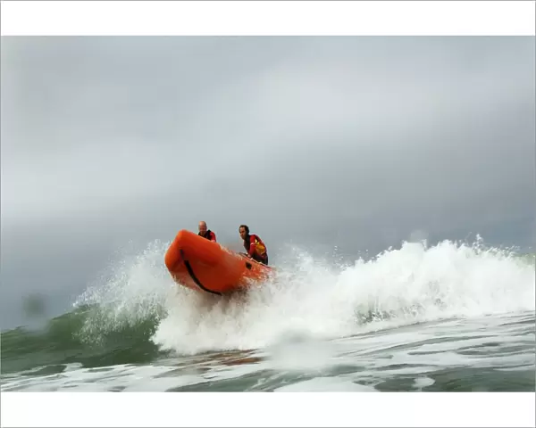 Woolacombe. RNLI lifeguards in an iArancia nshore rescue boat