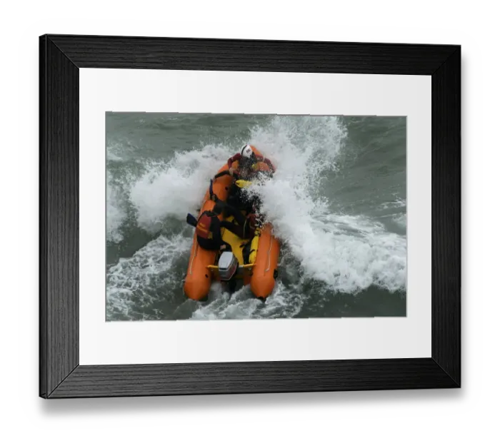 Framed Print : An arancia inshore rescue boat in heavy surf at Perranporth Framed Print : An arancia inshore rescue boat in heavy surf at Perranporth