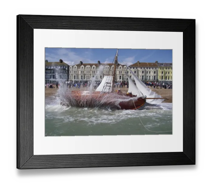 Framed Print : Service to a grounded yacht by Eastbourne lifeboat Framed Print : Service to a grounded yacht by Eastbourne lifeboat