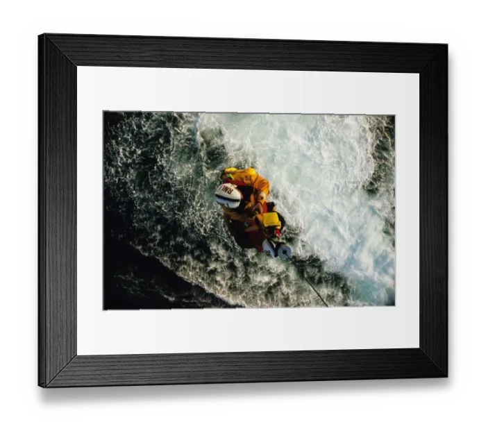 Framed Print : Appledore Lifeboat crew winching to helicopter Framed Print : Appledore Lifeboat crew winching to helicopter