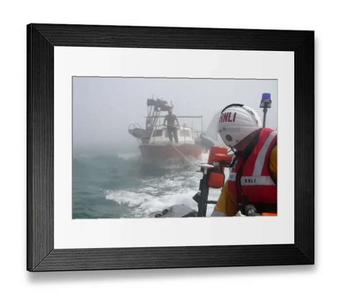 Framed Print : Vessel being towed by the Rye Harbour inshore lifeboat Framed Print : Vessel being towed by the Rye Harbour inshore lifeboat