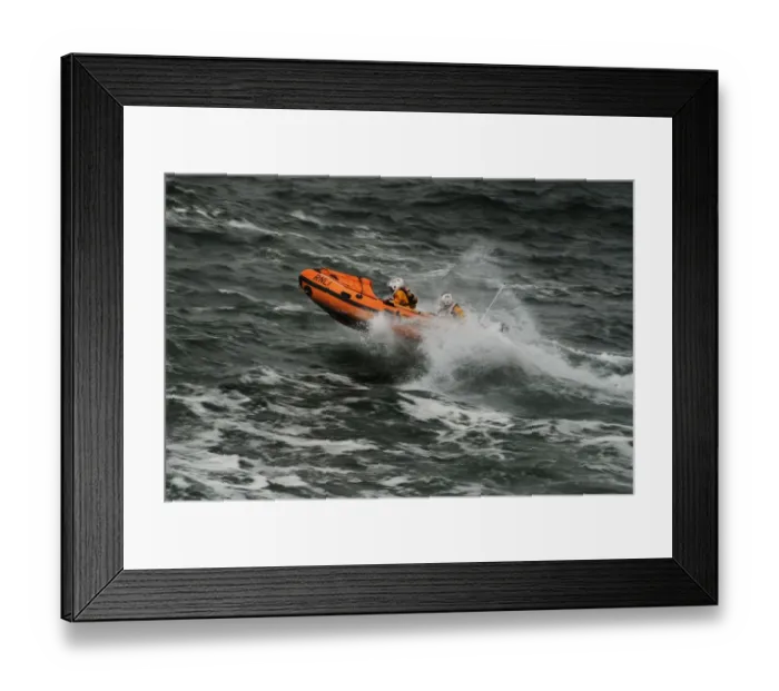 Framed Print : Ballyglass D-class inshore lifeboat The Western D-687. Lifeboat moving from right to left, three crew on board, bow out of the water Framed Print : Ballyglass D-class inshore lifeboat The Western D-687. Lifeboat moving from right to left, three crew on board, bow out of the water