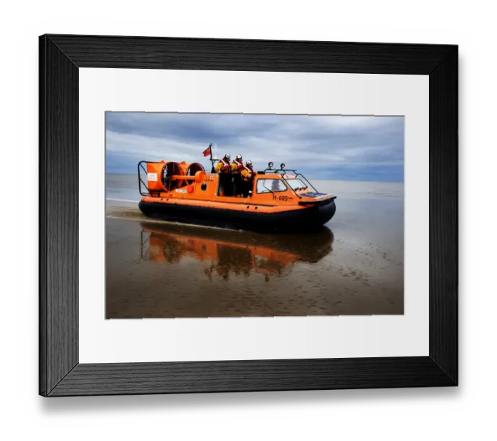 Framed Print : New Brighton hovercraft Hurley Spirit H-005 during a training exercise on mudflats. Four crew in view, hovercraft moving from left to right Framed Print : New Brighton hovercraft Hurley Spirit H-005 during a training exercise on mudflats. Four crew in view, hovercraft moving from left to right
