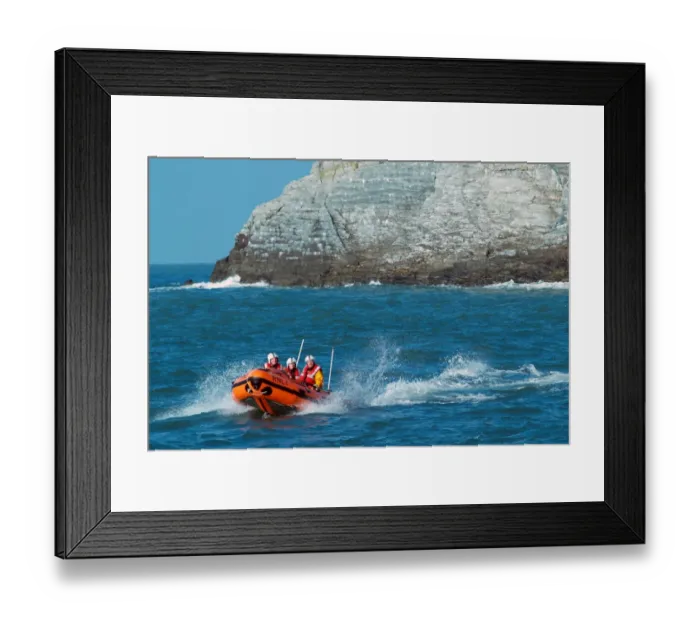 Framed Print : Holyhead D class lifeboat Angel of Holyhead D-654. Three crew onboard Framed Print : Holyhead D class lifeboat Angel of Holyhead D-654. Three crew onboard