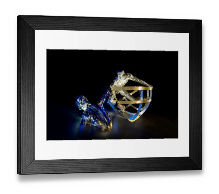 Framed Print : The RNLI memorial sculpture in Poole by night Framed Print : The RNLI memorial sculpture in Poole by night