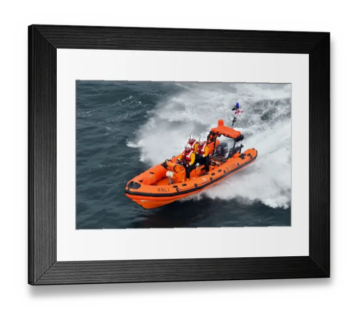 Framed Print : Red bay Atlantic 75 Dorothy May B-728. Aerial shot, lifeboat moving away towards the camera at speed, three crew on board Framed Print : Red bay Atlantic 75 Dorothy May B-728. Aerial shot, lifeboat moving away towards the camera at speed, three crew on board