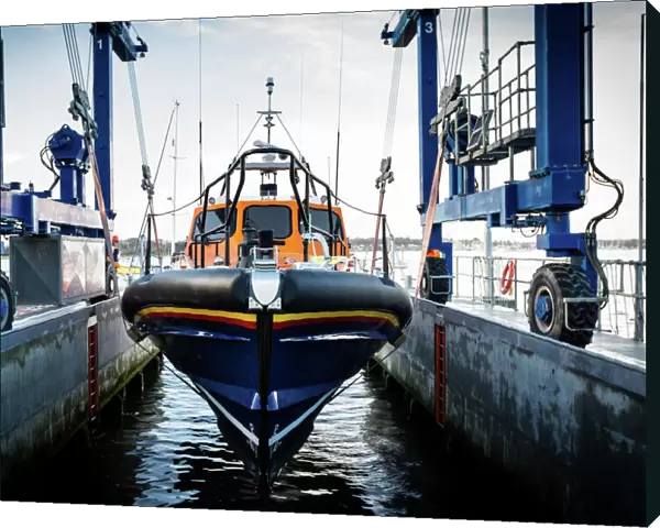 Launch of the first Shannon class lifeboat built at the All-Weather Lifeboat Centre (ALC) in Poole. The ceremonial bell was rung 8 times as the lifeboat Cosandra 13-12 was lowered into the water