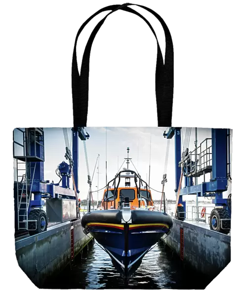 Launch of the first Shannon class lifeboat built at the All-Weather Lifeboat Centre (ALC) in Poole. The ceremonial bell was rung 8 times as the lifeboat Cosandra 13-12 was lowered into the water