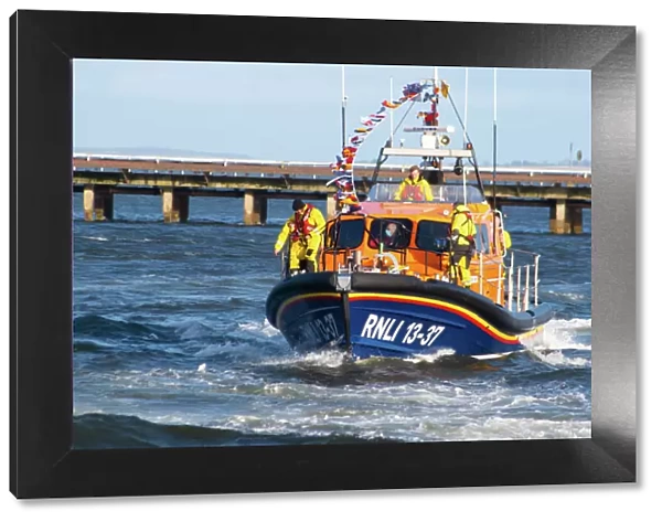 Invergordon Lifeboat RNLI 13-37 arriving at her new permanent home