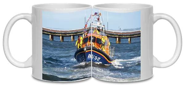 Invergordon Lifeboat RNLI 13-37 arriving at her new permanent home