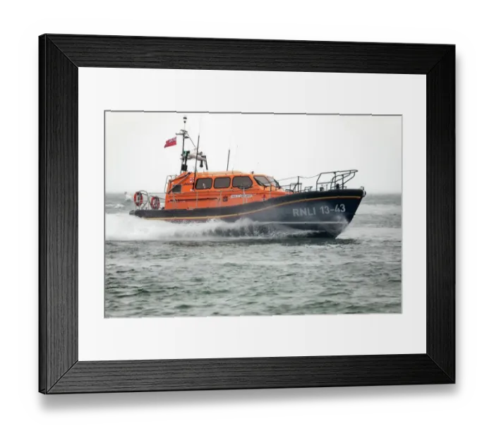 Framed Print : Clifden Shannon class lifeboat St Christopher 13-43 at sea during trials in Poole Bay. Shot from Shell Bay beach, Studland Framed Print : Clifden Shannon class lifeboat St Christopher 13-43 at sea during trials in Poole Bay. Shot from Shell Bay beach, Studland
