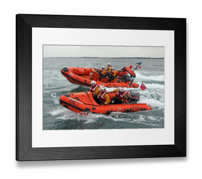 Framed Print : Littlehampton Atlantic 75 Blue Peter I. Three crew on board, lifeboat moving from right ot left in background. In foreground, D-class inshore lifeboat Spirit of Juniper D-634 Framed Print : Littlehampton Atlantic 75 Blue Peter I. Three crew on board, lifeboat moving from right ot left in background. In foreground, D-class inshore lifeboat Spirit of Juniper D-634