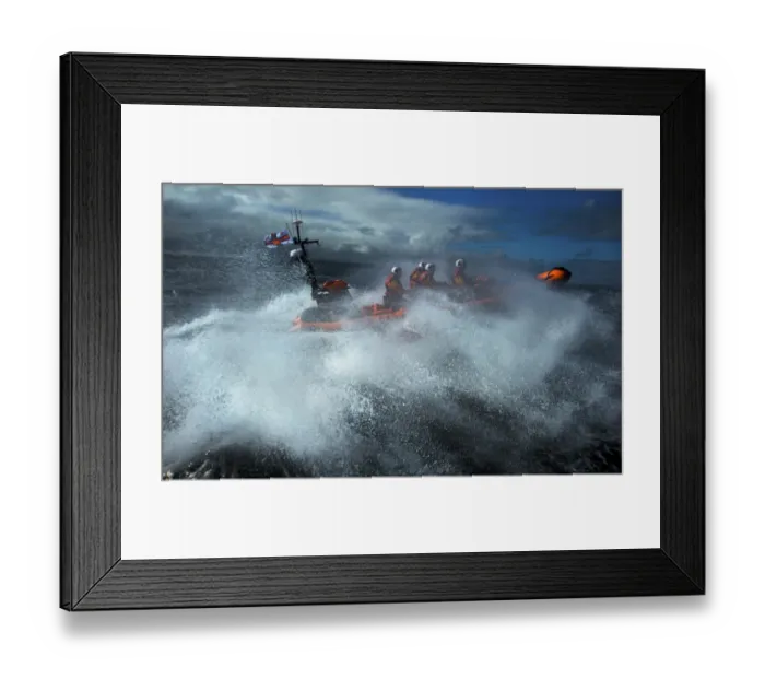 Framed Print : Red Bay Altantic 85 inshore lifeboat Geoffrey Charles B-843. Lifeboat moving from left to right at speed, four crew on board, lots of white spray Framed Print : Red Bay Altantic 85 inshore lifeboat Geoffrey Charles B-843. Lifeboat moving from left to right at speed, four crew on board, lots of white spray