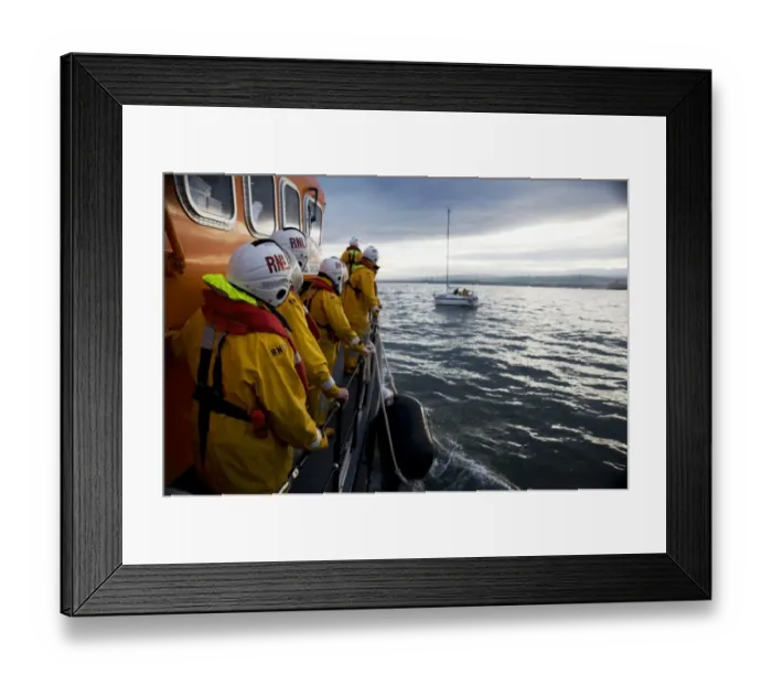 Framed Print : Bronze medal for gallantry reconstruction on board the Dunbar Trent class lifeboat John Neville Taylor 14-35. Crew members lined up on deck, yacht in the distance Framed Print : Bronze medal for gallantry reconstruction on board the Dunbar Trent class lifeboat John Neville Taylor 14-35. Crew members lined up on deck, yacht in the distance