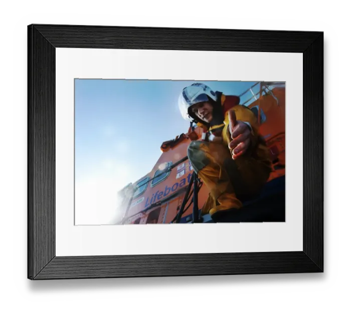 Framed Print : Crew member onboard Portrush Severn class lifeboat William Gordon Burr 17-30 reaching down towards the camera with hand extended Framed Print : Crew member onboard Portrush Severn class lifeboat William Gordon Burr 17-30 reaching down towards the camera with hand extended
