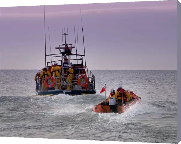 Hastings all weather and inshore lifeboats at sea