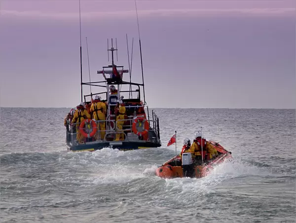 Hastings all weather and inshore lifeboats at sea