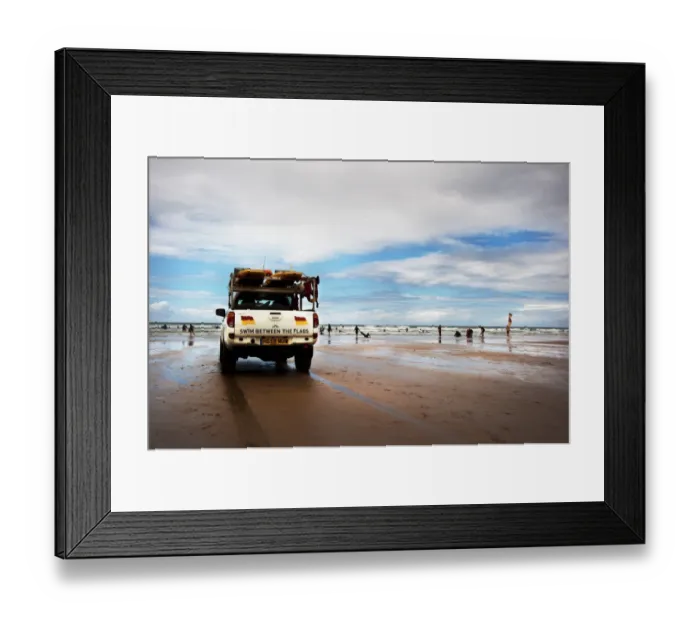 Framed Print : Lifeguards monitoring the beach from a patrol vehicle Framed Print : Lifeguards monitoring the beach from a patrol vehicle