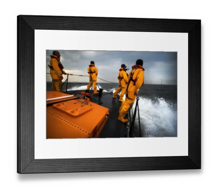 Framed Print : Crew members stood on the fore deck of the Hoylake lifeboat Lady of Hilbre Framed Print : Crew members stood on the fore deck of the Hoylake lifeboat Lady of Hilbre