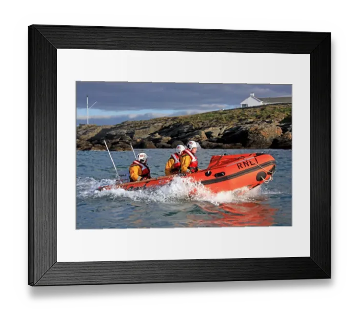 Framed Print : Trearddur Bay D-class inshore lifeboat Flo and Dick Smith D-614 during a training exercise. Lifeboat moving from left to right, three crew on board Framed Print : Trearddur Bay D-class inshore lifeboat Flo and Dick Smith D-614 during a training exercise. Lifeboat moving from left to right, three crew on board