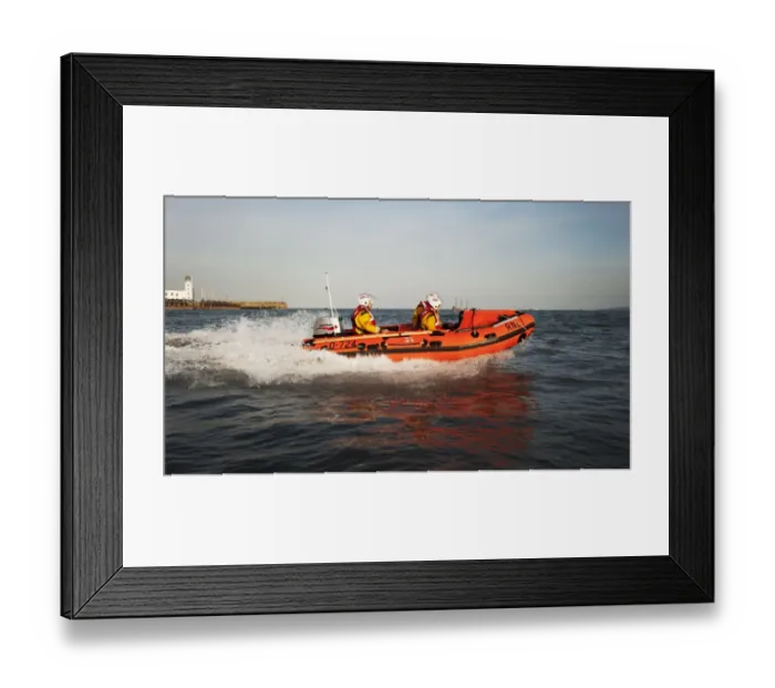 Framed Print : Exercise between Scarborough D-class inshore lifeboat and lifeguards. D-class John Wesley Hillard III D-724 lifeboat moving from left to right Framed Print : Exercise between Scarborough D-class inshore lifeboat and lifeguards. D-class John Wesley Hillard III D-724 lifeboat moving from left to right
