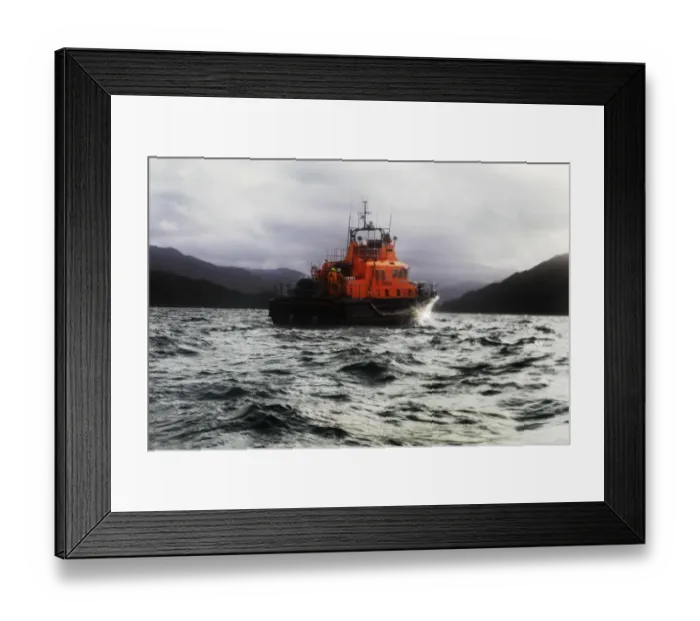 Framed Print : Mallaig severn class lifeboat Henry Alston Hewat 17-26. Lifeboat in the distance moving from left to right, hills and cliffs behind Framed Print : Mallaig severn class lifeboat Henry Alston Hewat 17-26. Lifeboat in the distance moving from left to right, hills and cliffs behind