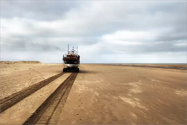 Wells Mersey class lifeboat Doris M Mann of Ampthill 12-003 being launched by carriage along the beach