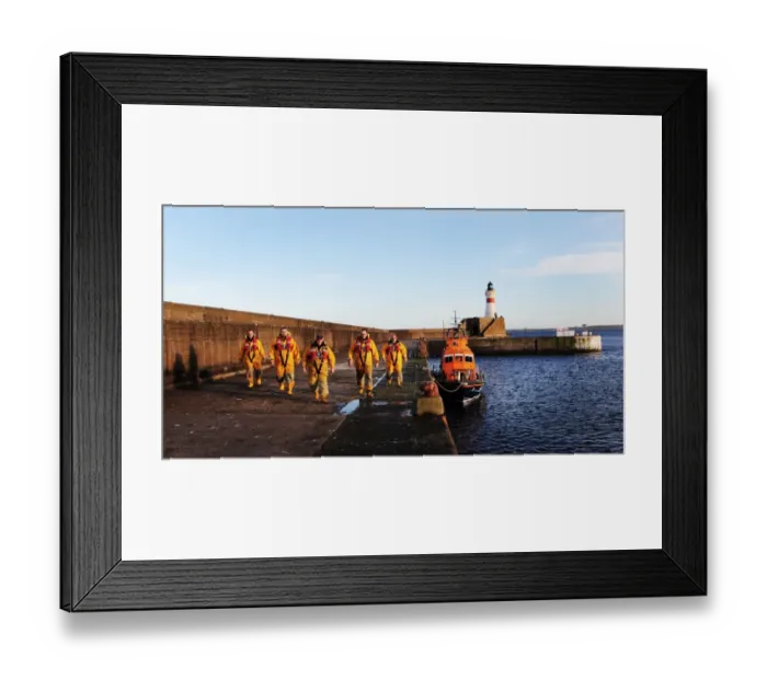 Framed Print : Fraserburgh crew members in full ALB kit next to the Trent class lifeboat Willie and Mary Gall 14-34 moored in the harbour Framed Print : Fraserburgh crew members in full ALB kit next to the Trent class lifeboat Willie and Mary Gall 14-34 moored in the harbour