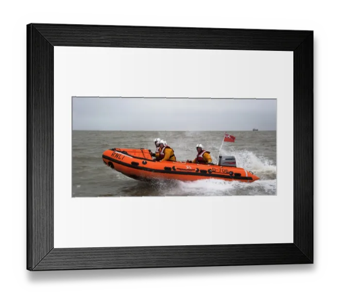 Framed Print : Margate D-class inshore lifeboat Tigger Three D-706. Lifeboat moving from right to left, three crew on board Framed Print : Margate D-class inshore lifeboat Tigger Three D-706. Lifeboat moving from right to left, three crew on board