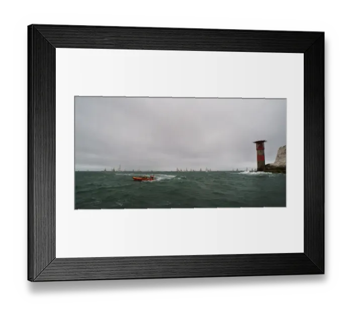 Framed Print : Lymington Atlantic 75 inshore lifeboat Victor Danny Lovelock B-784 during the Round the Island Race 2011. Racing yachts and the Needles lighthouse in the distance Framed Print : Lymington Atlantic 75 inshore lifeboat Victor Danny Lovelock B-784 during the Round the Island Race 2011. Racing yachts and the Needles lighthouse in the distance