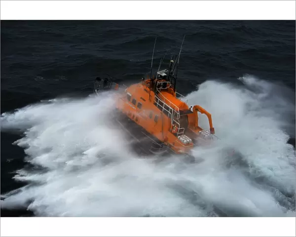 Valentia severn class lifeboat John and Margaret Doig 17-07. Aerial shot taken from Irish Coastguard helicopter, lots of white spray