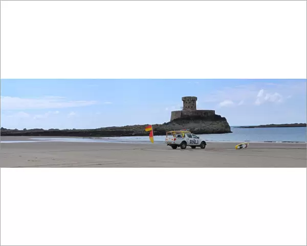Lifeguards monitoring the sea at a beach in Jersey from within a lifeguard patrol vehicle. Panoramic shot