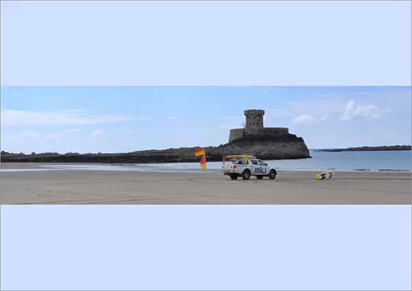 Lifeguards monitoring the sea at a beach in Jersey from within a lifeguard patrol vehicle. Panoramic shot