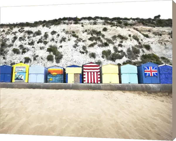 Landscape shot of the colourful beach huts at Broadstairs