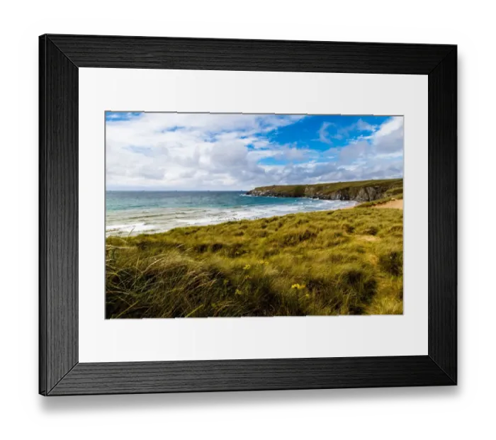 Framed Print : Landscape shot of Holywell beach, Cornwall. People in the sea swimming and surfing, lifeguards on an arancia inshore rescue boat in the distance by the cliffs Framed Print : Landscape shot of Holywell beach, Cornwall. People in the sea swimming and surfing, lifeguards on an arancia inshore rescue boat in the distance by the cliffs