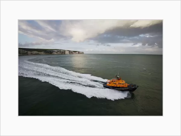 Dover severn class lifeboat City of London II 17-09 moving from left to right, white cliffs in the background