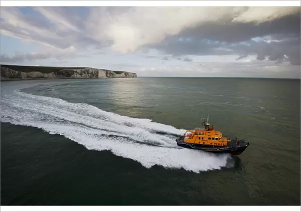 Dover severn class lifeboat City of London II 17-09 moving from left to right, white cliffs in the background