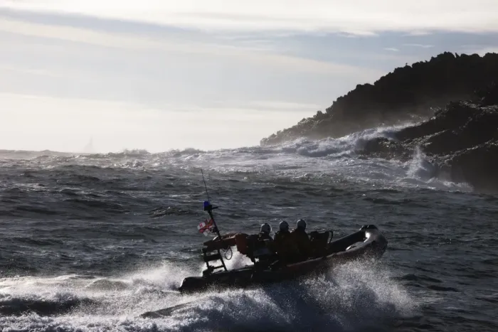 Framed Print : Baltimore Atlantic 75 inshore lifeboat Bessie B-708, waves breaking agasint rocks in the background Framed Print : Baltimore Atlantic 75 inshore lifeboat Bessie B-708, waves breaking agasint rocks in the background