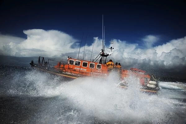 Baltimore Tyne class lifeboat Hilda Jarrett 47-024 moving from right to left, lots of white spray