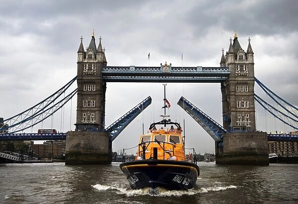 Eastbourne Tamar class lifeboat the Diamond Jubilee 16-23 on the Thames as part of the Queens Diamond Jubilee Pageant. Tower Bridge in the background