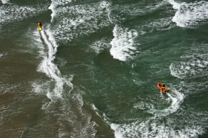 Framed Print : Lifeguards on a rescue watercraft (RWC) and arancia inshore rescue boat shot from Culdrose helicopter in St Ives