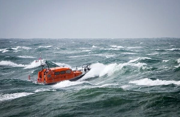 Prototype Shannon class FCB2 lifeboat in rough seas off Portland Bill