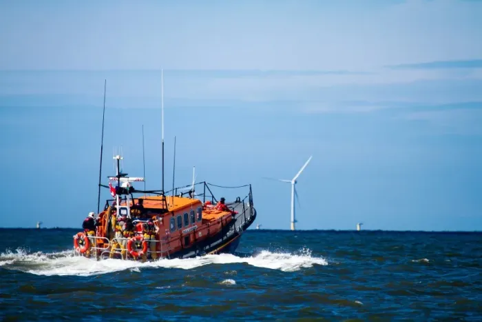 Framed Print : Rhyl Mersey class lifeboat Lil Cunningham 12-24 heading out to sea, windfarms in the distance Framed Print : Rhyl Mersey class lifeboat Lil Cunningham 12-24 heading out to sea, windfarms in the distance