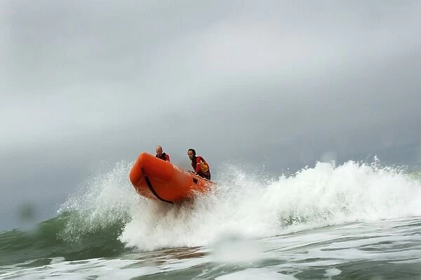 Woolacombe. RNLI lifeguards in an iArancia nshore rescue boat