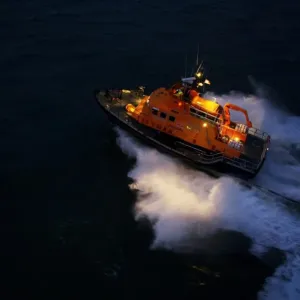 Aran Islands severn class lifeboat David Kirkaldy 17-06. Aerial shot taken from Irish Coastguard helicopter, lifeboat heading from right to left at night Aran Islands severn class lifeboat David Kirkaldy 17-06. Aerial shot taken from Irish Coastguard helicopter, lifeboat heading from right to left at night