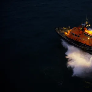 Aran Islands severn class lifeboat David Kirkaldy 17-06. Aerial shot taken from Irish Coastguard helicopter, lifeboat heading from right to left at night