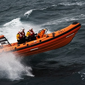 Atlantic 75 inshore lifeboat Dorothy Mary B-728. Lifeboat moving from left to right at speed, lots of white spray